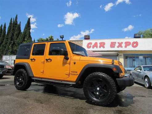 2013 Jeep Wrangler Unlimited Sport - cars & trucks - by dealer -... for sale in Downey, CA