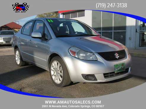 2011 Suzuki SX4 - Financing Available! - cars & trucks - by dealer -... for sale in Colorado Springs, CO