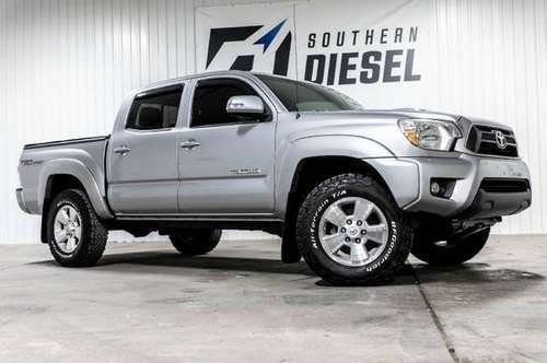 2014 Toyota Tacoma 4WD Double Cab V6 MT - cars & trucks - by dealer... for sale in Oswego, NY