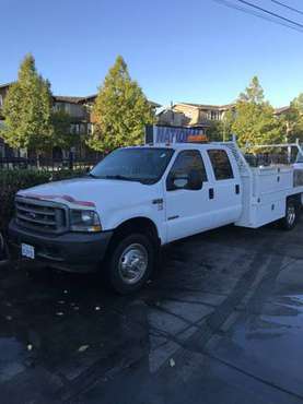 2003 Ford F550 Crew Cab flatbed with boxes & fuel tank - cars &... for sale in Orland, OR