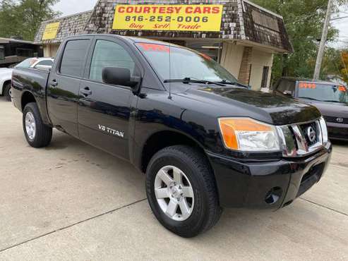 2009 Nissan Titan LE Crew Cab 4x4 - cars & trucks - by dealer -... for sale in Independence, MO 64053, MO