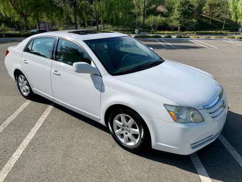 Toyota Avalon LOW MILES! - cars & trucks - by owner - vehicle... for sale in Huntington Beach, CA