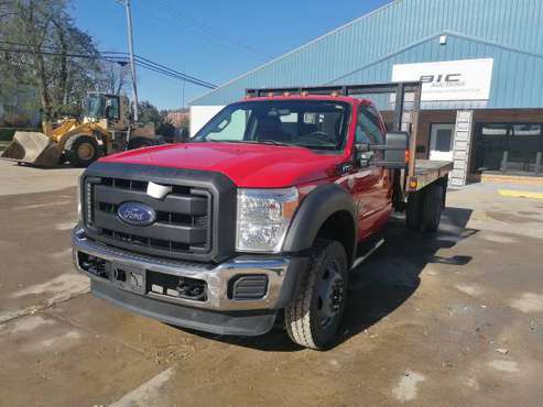 2014 Ford F550 4 x 4 Flat Bed Truck - cars & trucks - by owner -... for sale in Bettendorf, IA