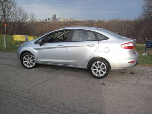 2016 FORD FIESTA SE 4DR SEDAN (new lowered price) - cars & trucks -... for sale in Rochester , NY