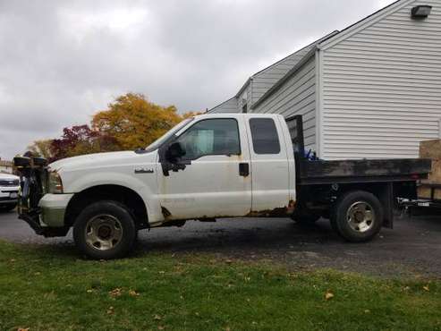 2005 Ford F-250 4x4 with 7ft Fisher Plow - cars & trucks - by owner... for sale in Lewiston, NY