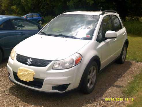 2007 White Suzuki SX4 - cars & trucks - by owner - vehicle... for sale in Candor, NY