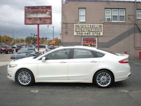 2014 Ford Fusion SE - cars & trucks - by dealer - vehicle automotive... for sale in Roseville, MI