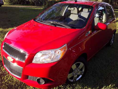 Only 15K Miles Just like new Chevy Aveo - - by dealer for sale in Holiday, FL