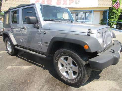 2014 Jeep Wrangler Unlimited Sport - cars & trucks - by dealer -... for sale in Downey, CA