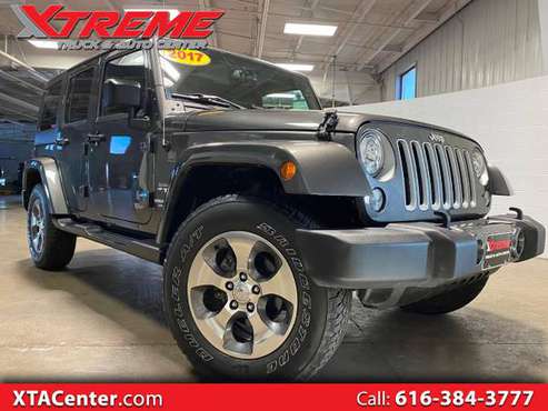 2017 Jeep Wrangler 4WD 4dr Unlimited Sahara - - by for sale in Coopersville, MI