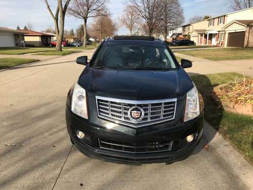 2012 CADILLAC SRX LIMITED AWD - cars & trucks - by owner - vehicle... for sale in Sterling Heights, MI