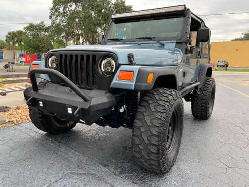 Jeep Wrangler 6cyl 35’s New Lift - cars & trucks - by owner -... for sale in Port Charlotte, FL
