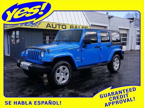 2011 Jeep Wrangler Unlimited Sahara - cars & trucks - by dealer -... for sale in Holland , MI