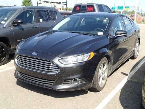 2015 Ford Fusion sedan SE (Tuxedo Black) GUARANTEED APPROVAL for sale in Sterling Heights, MI