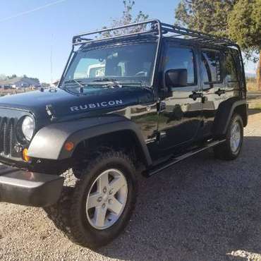 2012 Jeep Wrangler RUBICON 4x4 + GOBI rack + extra rims/Studded Tires for sale in Bend, OR
