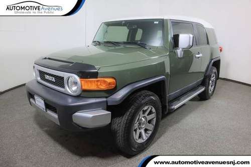 2014 Toyota FJ Cruiser, Army Green - cars & trucks - by dealer -... for sale in Wall, NJ
