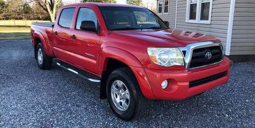 Look high and low for a Great Red 2006 Tacoma than this one for sale in U.S.