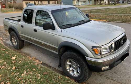 2004 Toyota Tacoma 4wd 4 door V6 - cars & trucks - by owner -... for sale in Ames, IA