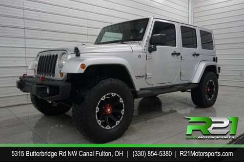 2012 Jeep Wrangler Unlimited Sahara 4WD Your TRUCK Headquarters! We for sale in Canal Fulton, PA