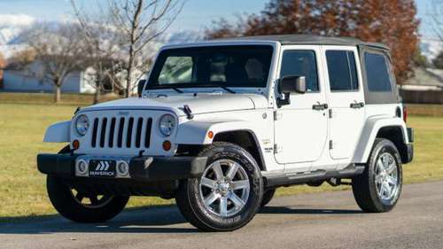2013 Jeep Wrangler 4x4 4WD Unlimited Sahara SUV - cars & trucks - by... for sale in Boise, ID