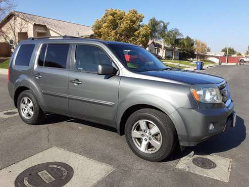 2009 Honda pilot ex 4wd - cars & trucks - by owner - vehicle... for sale in Bakersfield, CA