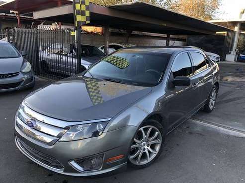 2011 Ford Fusion - Financing Available! - cars & trucks - by dealer... for sale in Phoenix, AZ