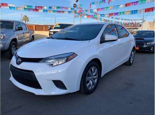 2015 Toyota Corolla LE Sedan 4D WE WORK WITH ALL CREDIT... for sale in Modesto, CA