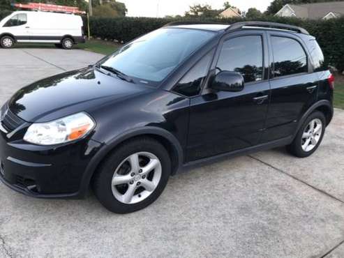 2009 SUZUKI SX4--Clean Solid Car--"One Owner" Priced to Sell - cars... for sale in Buford, GA