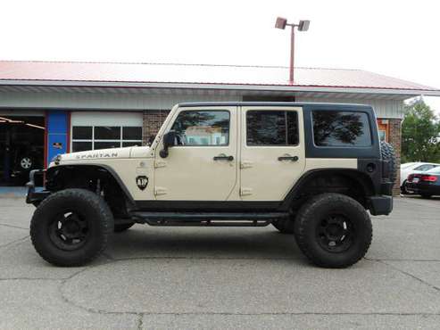 ★★★ 2011 Jeep Wrangler Unlimited 4x4 / Lifted with Wheels! ★★★ -... for sale in Grand Forks, MN