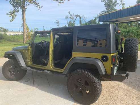 4 door Jeep Wrangler jk unlimited sport for sale in Panama City, FL