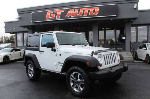 2011 Jeep Wrangler *Sport SUV Manual 4x4* - cars & trucks - by... for sale in PUYALLUP, WA