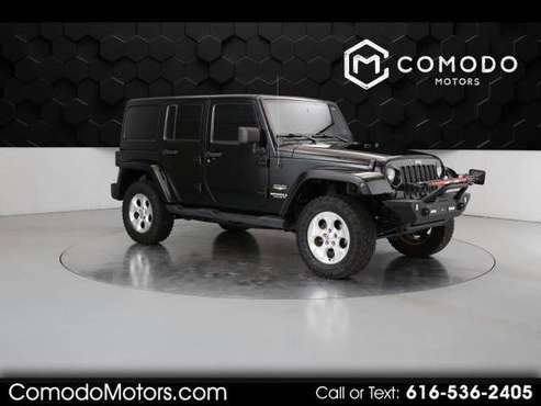 2013 Jeep Wrangler Unlimited Sahara 4WD - cars & trucks - by dealer... for sale in Caledonia, MI