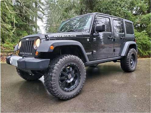 2013 Jeep Wrangler Unlimited Rubicon 6-Spd Manual Lifted - cars & for sale in Bremerton, WA