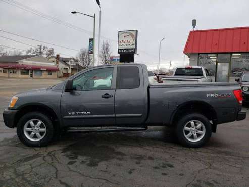 2010 Nissan Titan PRO 4X 4x4 4dr King Cab SWB Pickup - ALL TYPES OF for sale in Grand Rapids, MI
