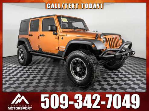 Lifted 2011 *Jeep Wrangler* Unlimited Sport 4x4 - cars & trucks - by... for sale in Spokane Valley, WA