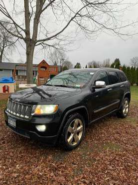 2011 Jeep Grand Cherokee Overland/Summit - cars & trucks - by owner... for sale in Cicero, NY