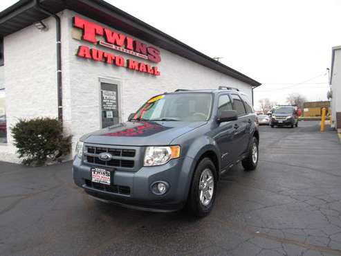 2011 Ford Escape 4WD Hybrid - cars & trucks - by dealer - vehicle... for sale in Rockford, WI