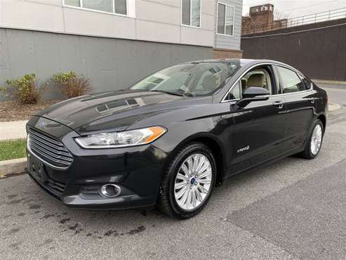 2014 Ford Fusion Hybrid SE - cars & trucks - by owner - vehicle... for sale in Paterson, NJ