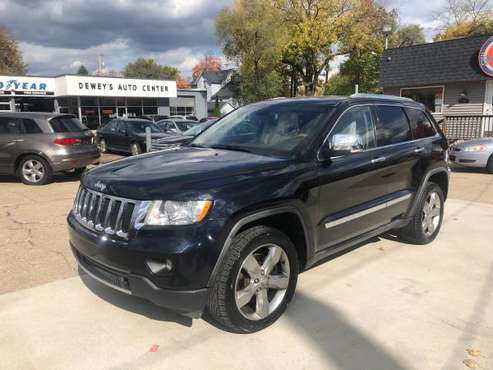 2011 Jeep Grand Cherokee Overland **4x4**LOADED - cars & trucks - by... for sale in Fenton, MI