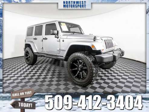 Lifted 2013 *Jeep Wrangler* Unlimited Sahara 4x4 - cars & trucks -... for sale in Pasco, WA