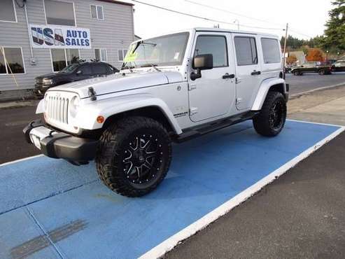 2012 Jeep Wrangler Unlimited Sahara - - by dealer for sale in Kelso, OR