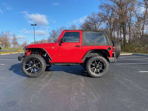 2017 Jeep Wrangler**LIFTED**22,000 MILES**4x4**6 SPEED MANUAL - cars... for sale in O Fallon, MO