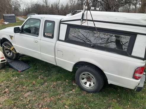 2006 Ford Ranger Super Cap w/ Topper. Repairs needed - cars & trucks... for sale in Marne, MI
