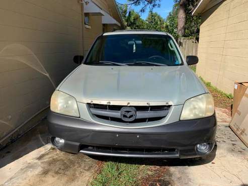 2004 Mazda Tribute ES (CREME) - cars & trucks - by owner - vehicle... for sale in PORT RICHEY, FL