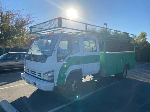ISUZU NPR QUAD CAB LOW MILES $12500 - cars & trucks - by owner -... for sale in West Covina, CA