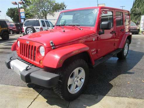 2012 Jeep Wrangler Unlimited Sahara - cars & trucks - by dealer -... for sale in Downey, CA