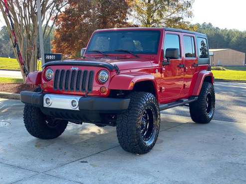Lifted 11 Jeep Wrangler Unlimited Sahara 4x4 loaded! - cars & trucks... for sale in Easley, SC