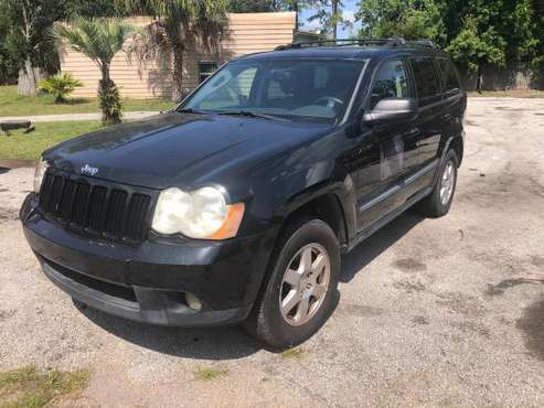 2009 jeep grande cherokeee no rust no dents very clean inside - cars for sale in Christmas, FL