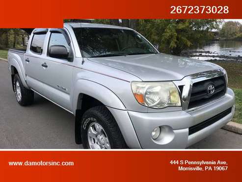 2006 Toyota Tacoma Double Cab - Financing Available! - cars & trucks... for sale in Morrisville, NY