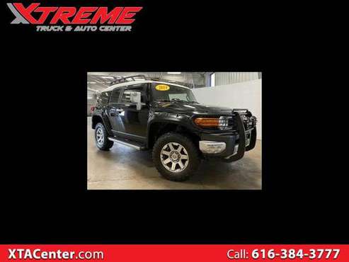 2014 Toyota FJ Cruiser 4WD AT - cars & trucks - by dealer - vehicle... for sale in Coopersville, MI